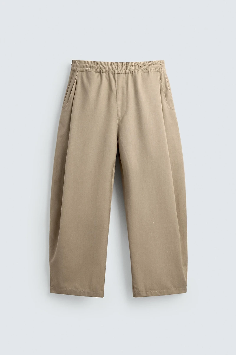 PLEATED BALLOON FIT PANTS