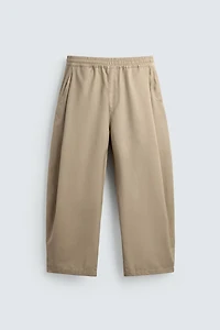 PLEATED BALLOON FIT PANTS