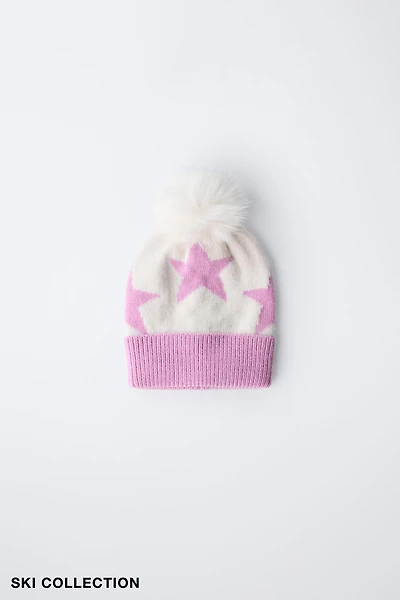 BONNET EN MAILLE ÉTOILES POMPON COLLECTION SKI
