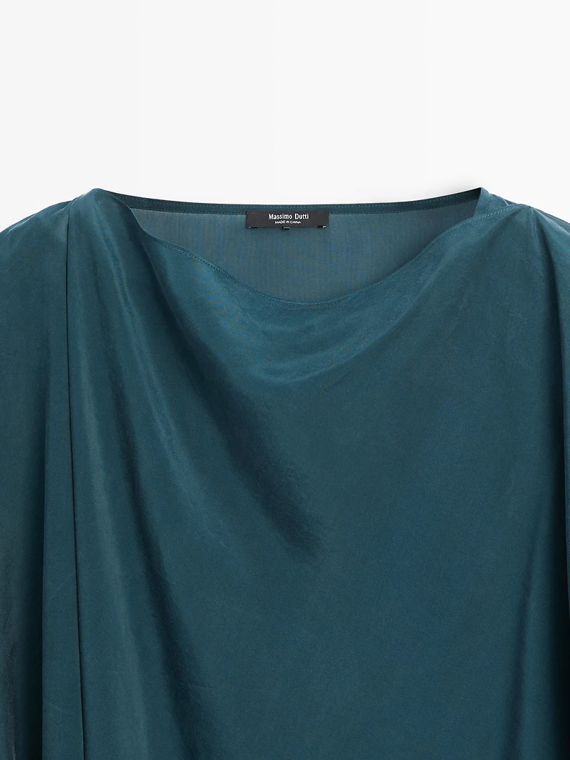 Flowing cape-style blouse