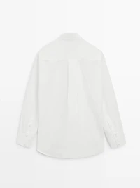 Bib front shirt with embroidered detail