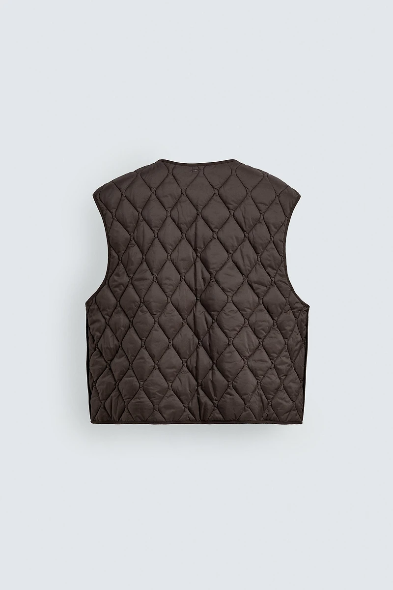 TECHNICAL JACKET WITH REMOVABLE VEST