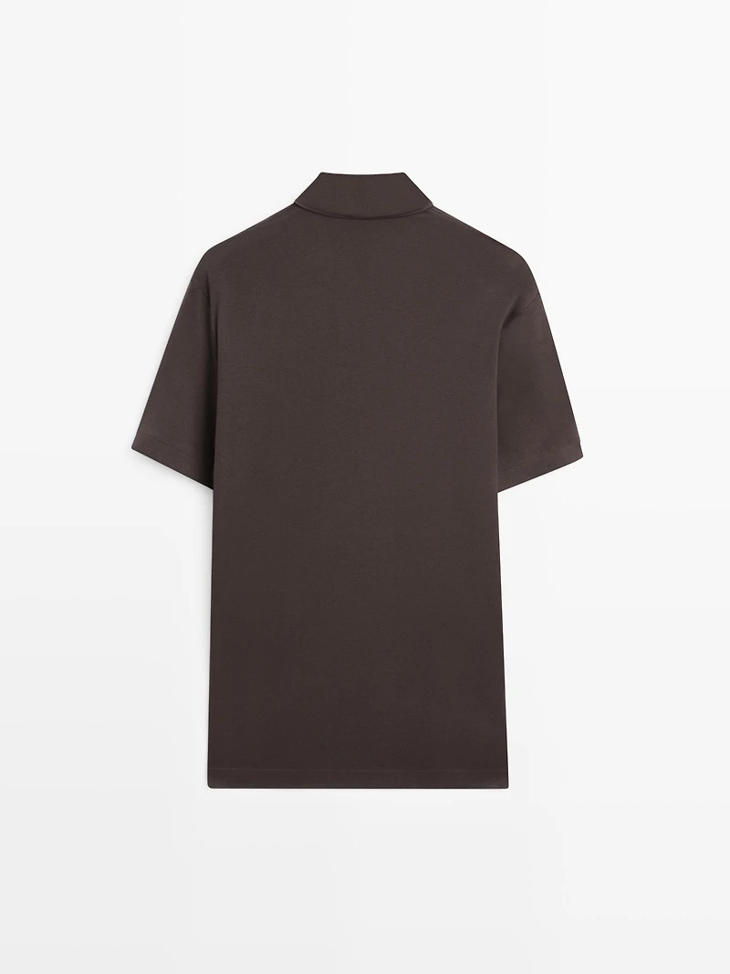 Short sleeve cotton blend knit polo shirt