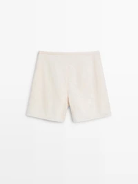 Shorts with fabric detail