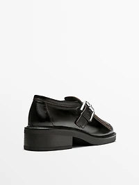 Buckled derby shoes with fringe