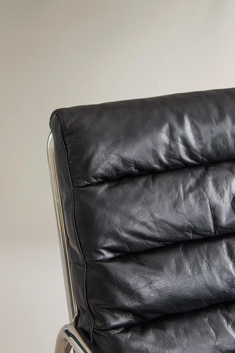 LEATHER AND STAINLESS STEEL ACCENT CHAIR