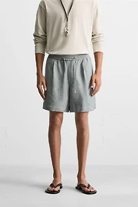 FLOWY RELAXED FIT BERMUDA SHORTS