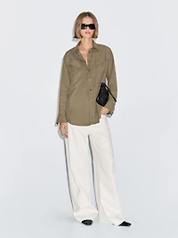 Long shirt with pocket details