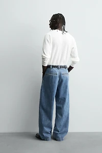 JEAN COUPE AMPLE À PLIS