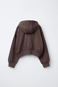 RAISED TEXT HOODIE