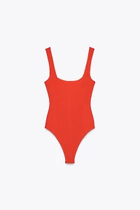 TEXTURED STRAPPY BODYSUIT