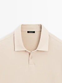 100% cotton distressed-effect polo shirt