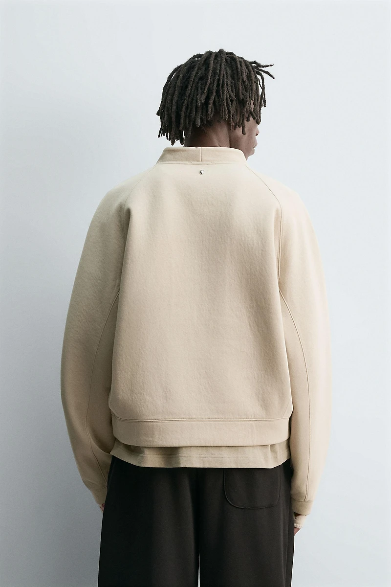 CROPPED FIT NEOPRENE EFFECT SWEATSHIRT WITH STUDS