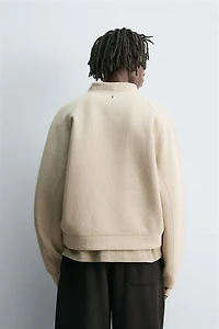 CROPPED FIT NEOPRENE EFFECT SWEATSHIRT WITH STUDS