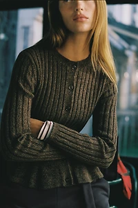GILET EN MAILLE CANNELÉ PEPLUM