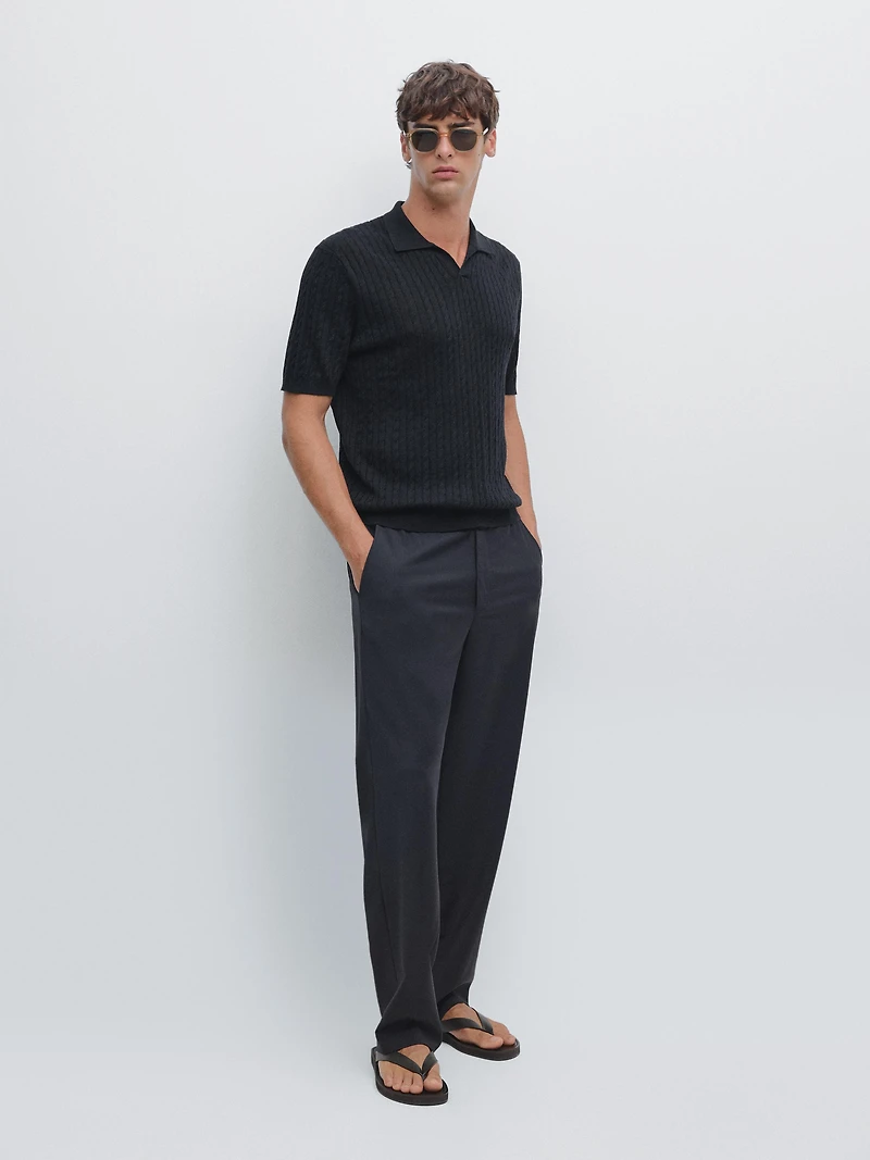 Polo en maille tressée