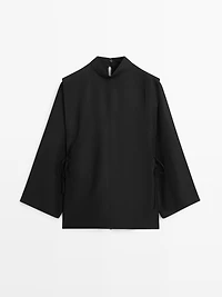 Mock turtleneck shirt with tie details