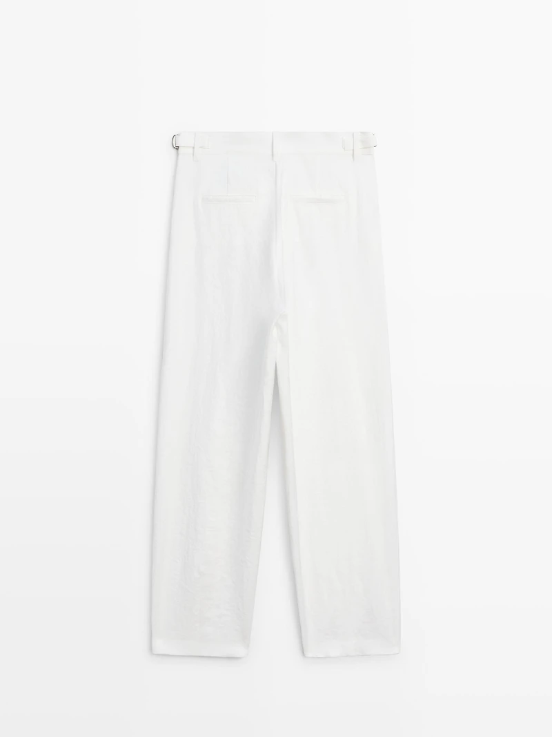 Flowing trousers with buckles
