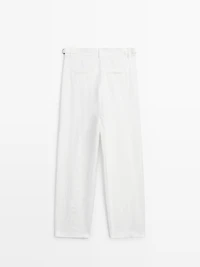 Flowing trousers with buckles