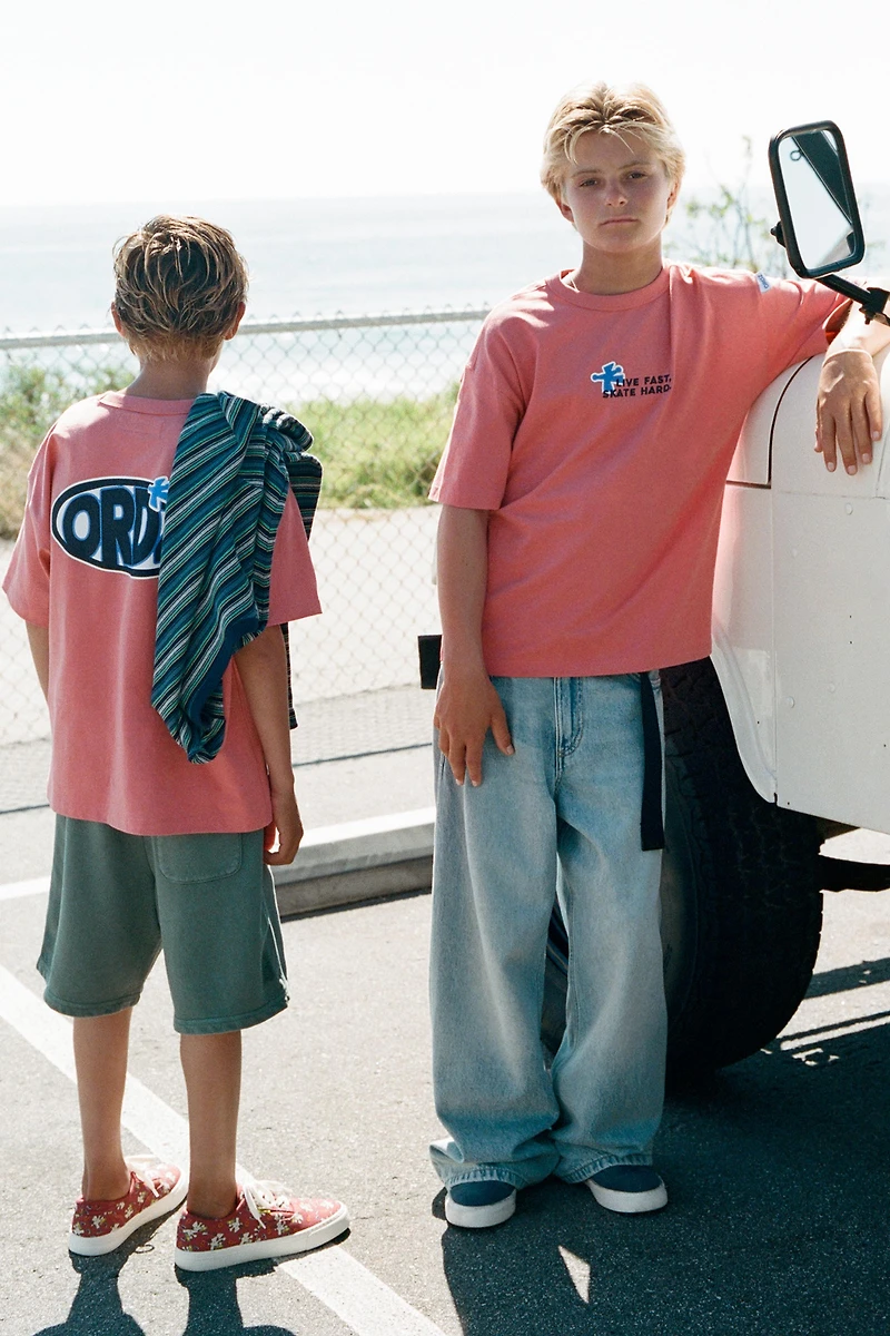 GARMENT DYED LOGO PLUSH SHORTS