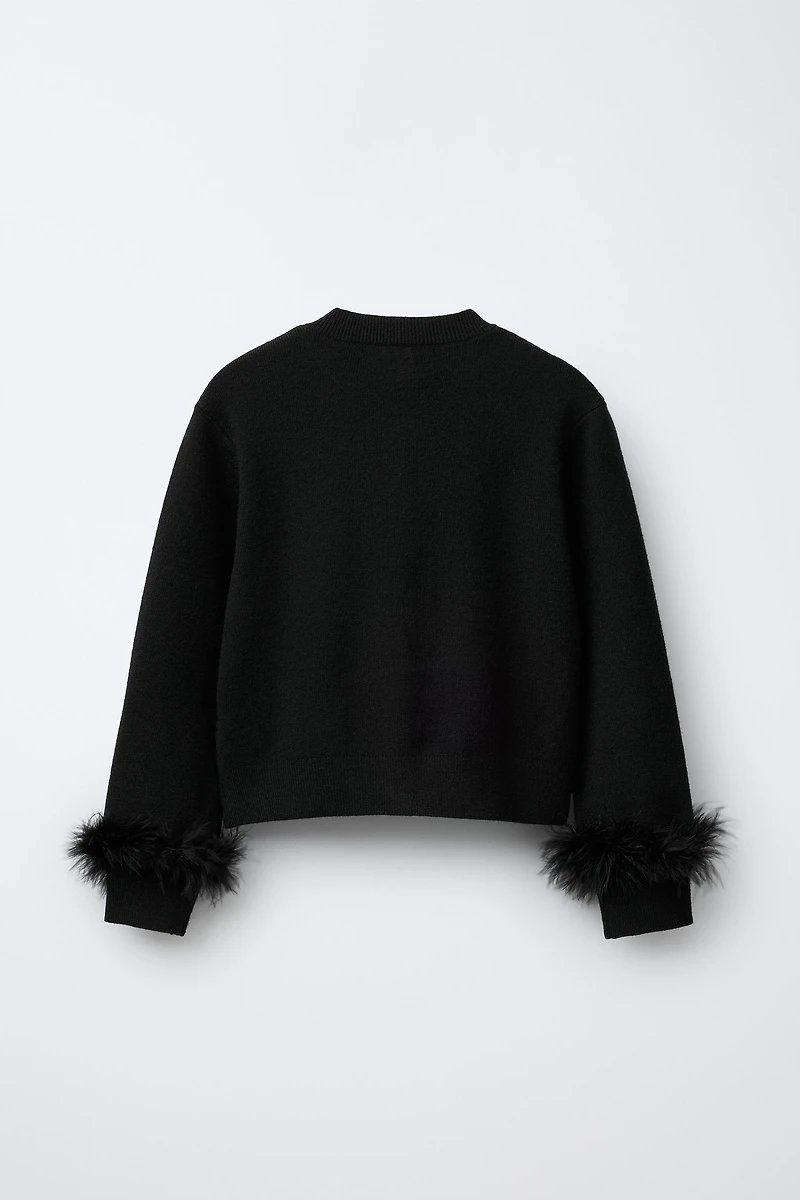 GILET EN MAILLE PLUMES DÉTACHABLES