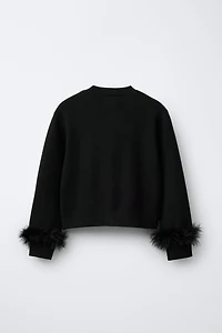 GILET EN MAILLE PLUMES DÉTACHABLES