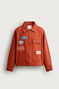 BLOUSON CROPPED À BRODERIES ET PIÈCES