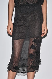 JUPE SEMI-TRANSPARENTE EN MAILLE STRUCTURÉE
