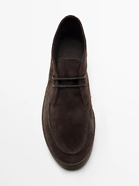 Chaussures montantes à bord mocassin