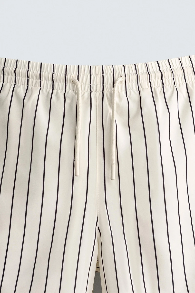 STRIPED MID-LENGTH SWIM TRUNKS