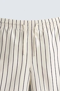 STRIPED MID-LENGTH SWIM TRUNKS
