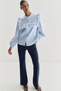 CHEMISE À RAYURES, VOLANTS ET FIL MÉTALLISÉ