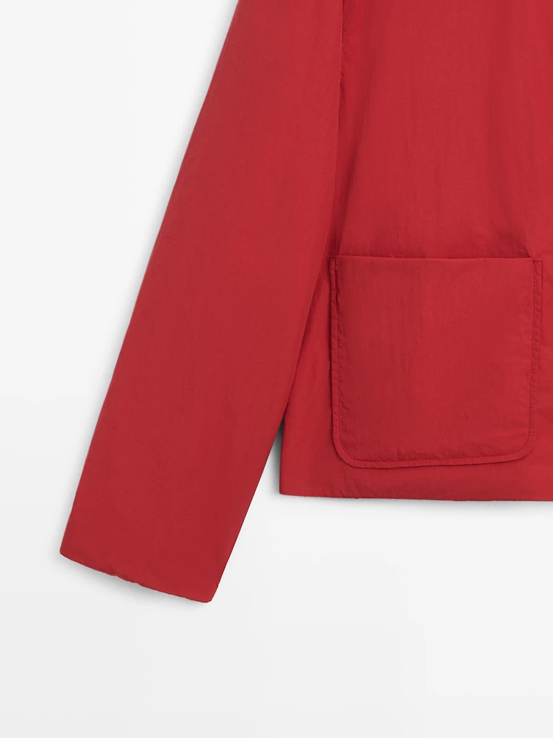 Veste courte matelassée avec poches