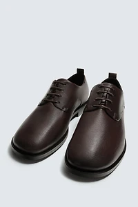 CHAUSSURES CHIC EN CUIR