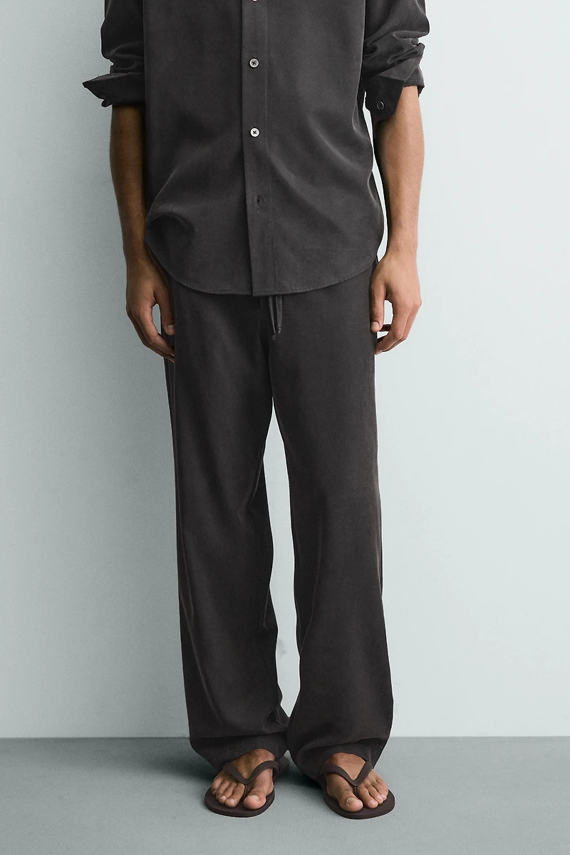 RELAXED FIT FLOWY PANTS