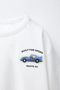 T-SHIRT AVEC APPLIQUÉ EN CAOUTCHOUC