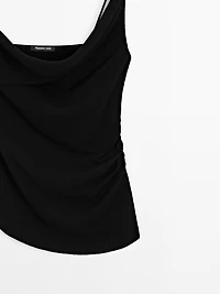 100% cotton top with asymmetric neckline