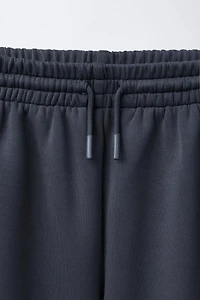 JOGGERS WITH CONTRASTING PIPING