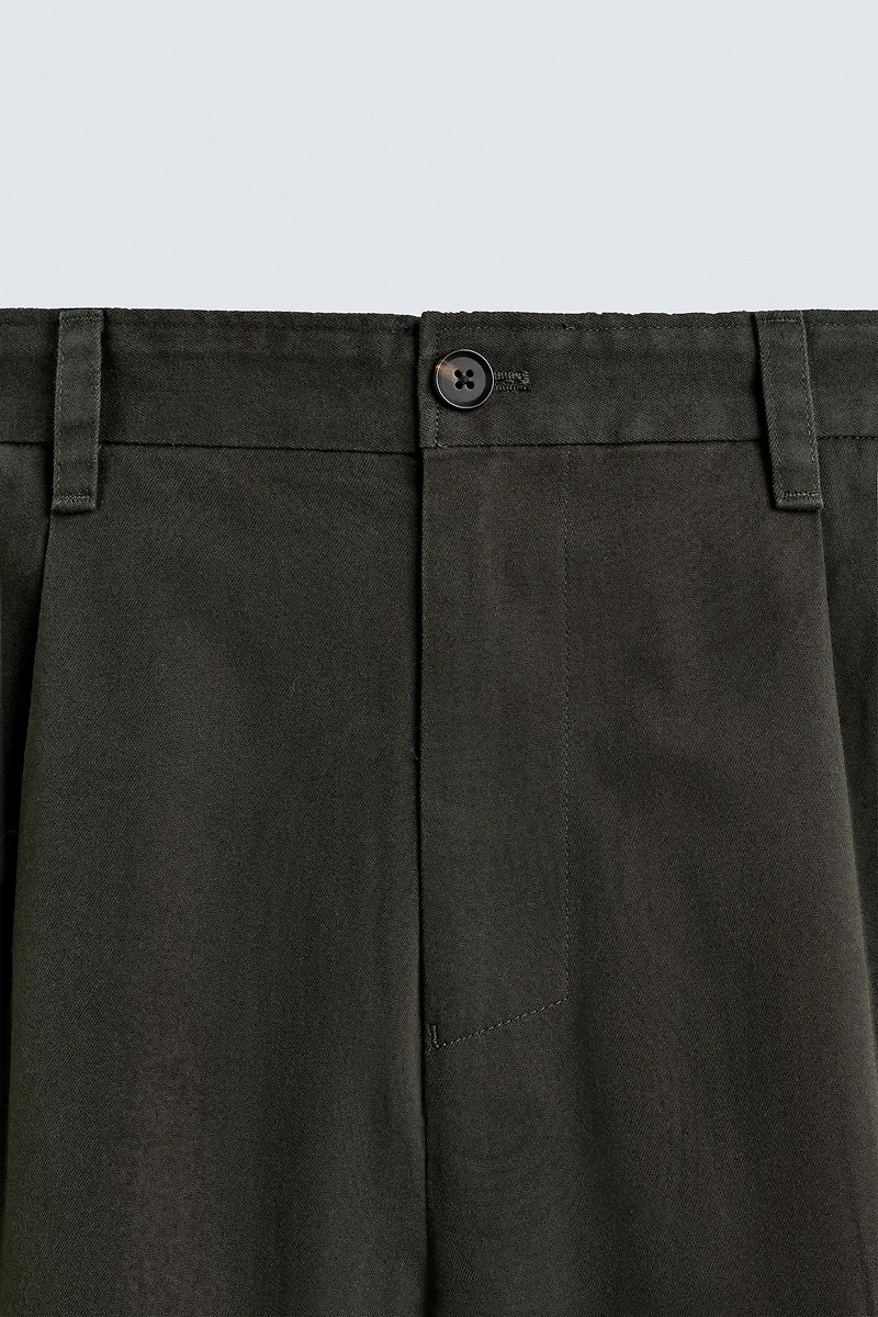 REGULAR FIT PLEATED PANTS