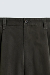 REGULAR FIT PLEATED PANTS