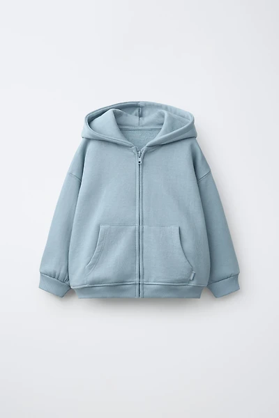 SWEAT ZIPPÉ À CAPUCHE