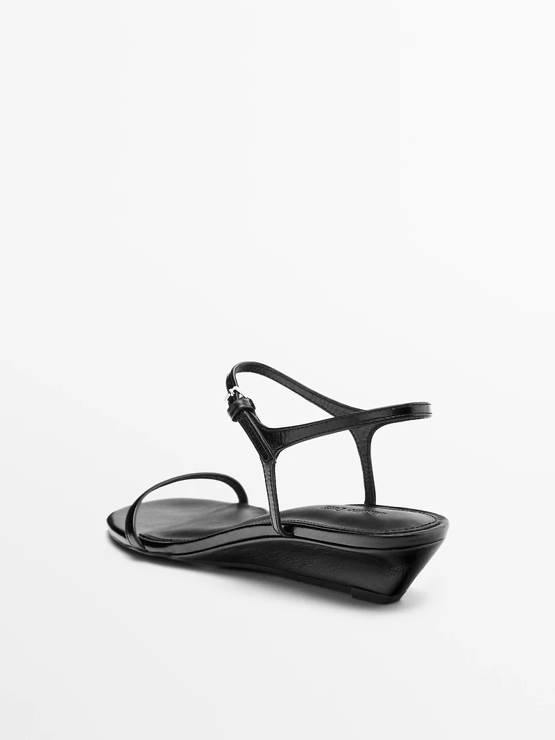 Strappy leather mid-wedge sandals