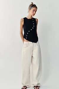 TOP EN MAILLE À FERMETURE ASYMÉTRIQUE