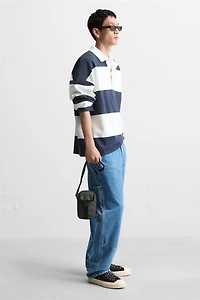 RUBBERIZED CROSSBODY BAG