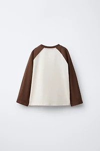 NAON JEONG © RAGLAN SLEEVE T-SHIRT