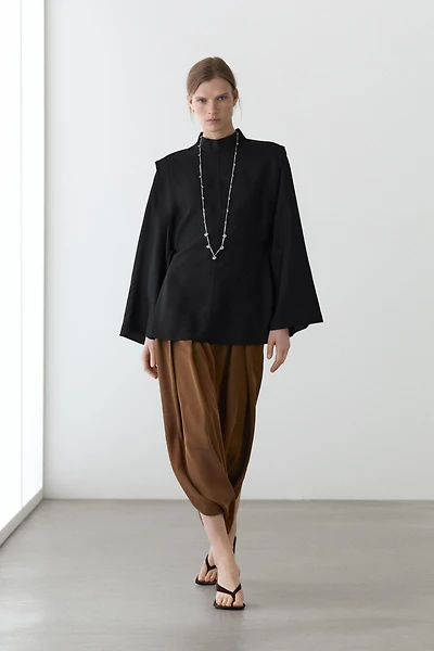 Mock turtleneck shirt with tie details