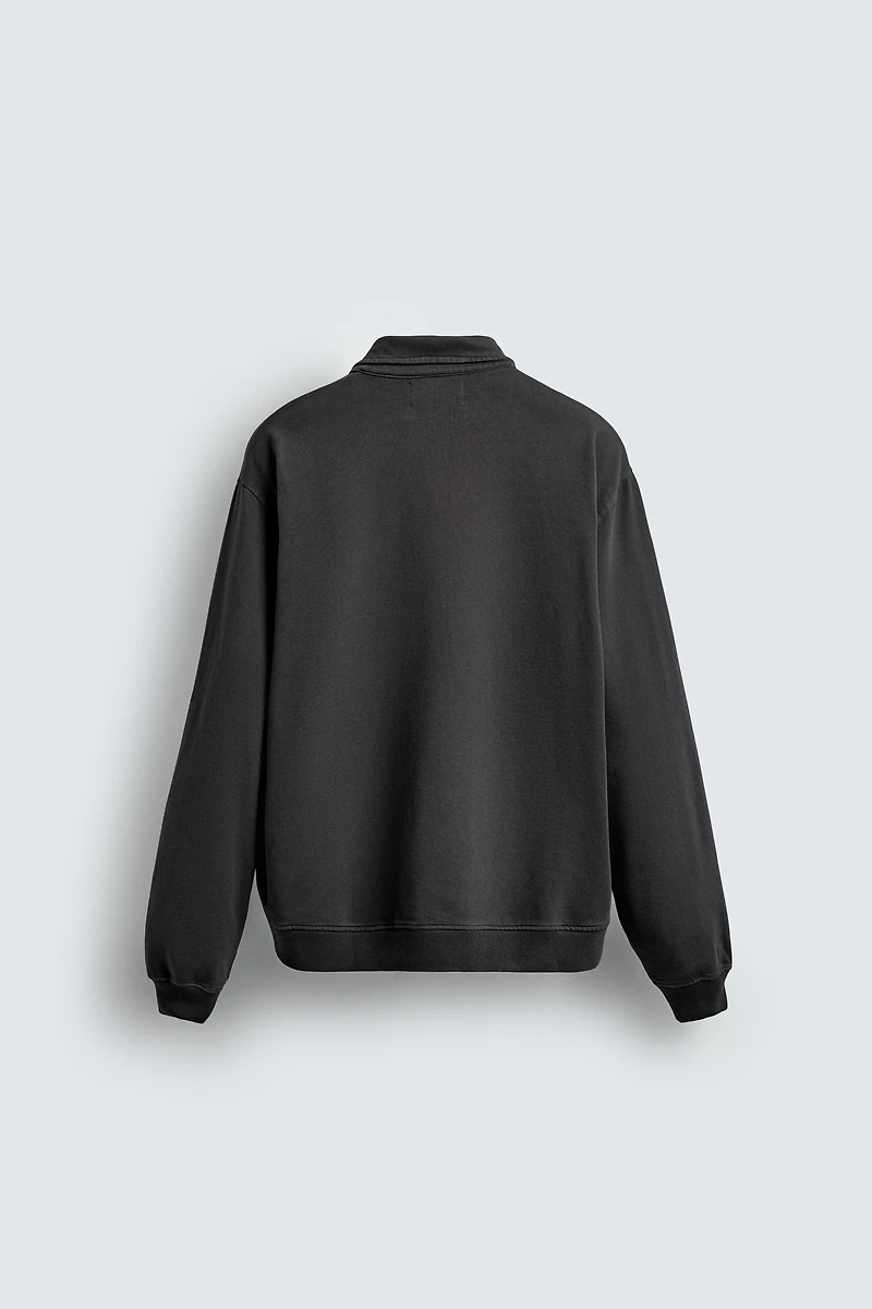 WASHED QUARTER-ZIP SWEATSHIRT