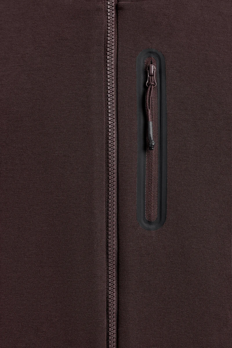 SWEAT TECHNIQUE ZIPPÉ À CAPUCHE
