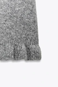 PULL EN MAILLE MANCHES COURTES À VOLANTS