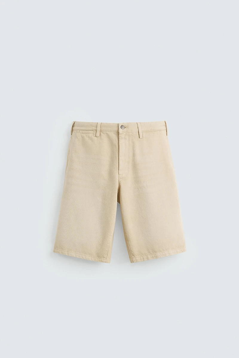 BAGGY FIT BERMUDA SHORTS © OTIS KWAME KYE QUAICOE